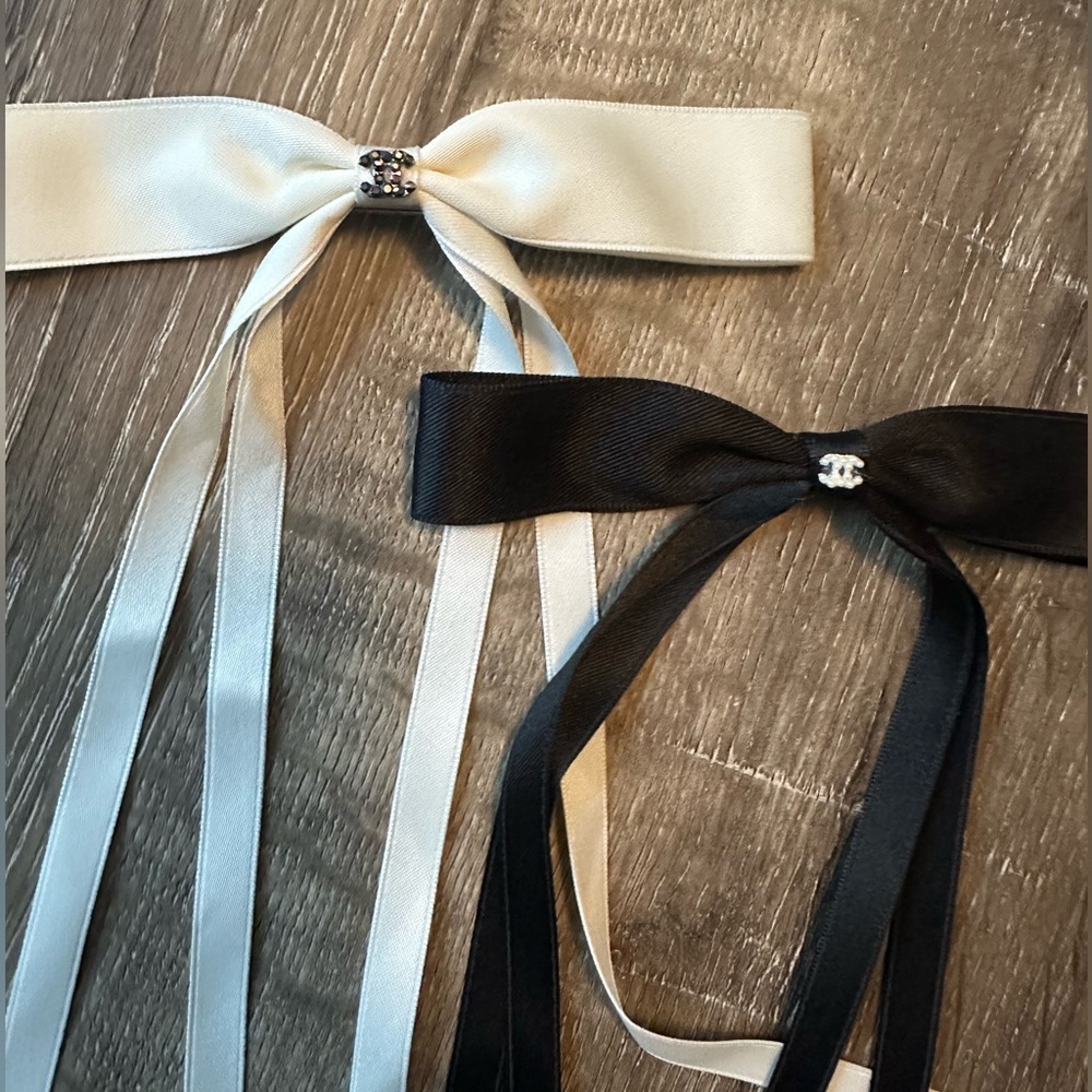 Two bow with charms